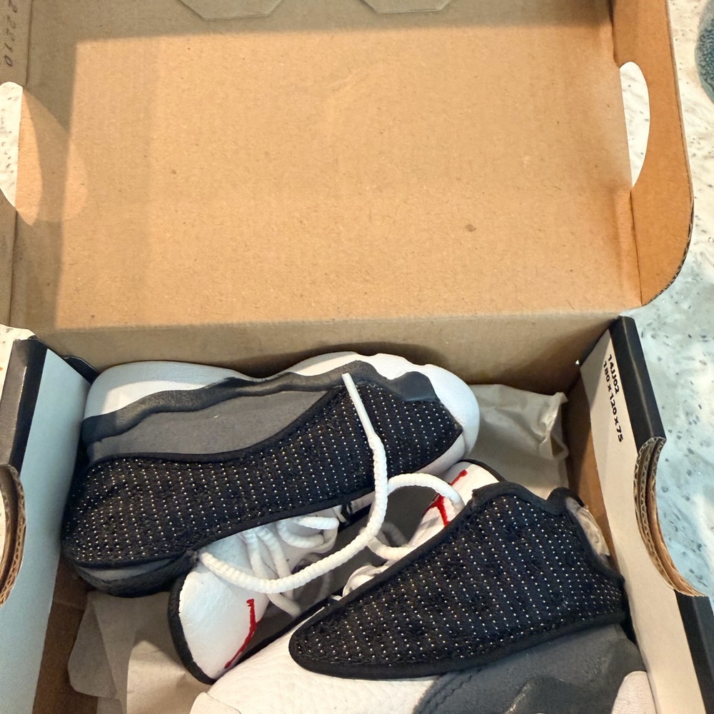 Jordan 13 Retro Black and Red Sneakers